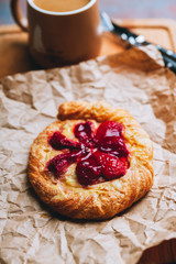 Sweet homemade creamy tart with glazed strawberry. Selective focus. Shallow depth of field.