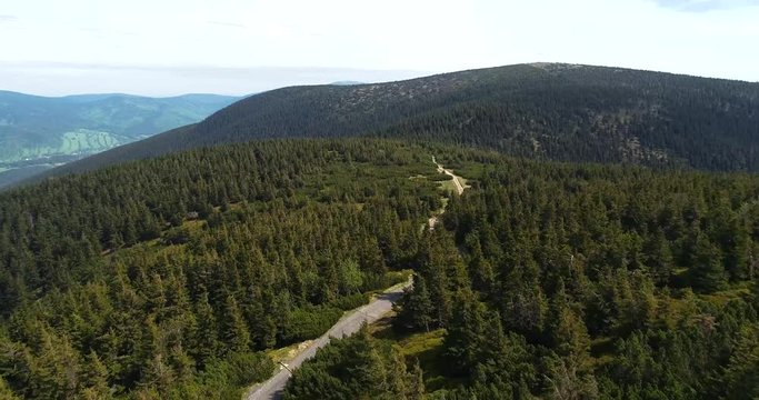 Aerial view of the top of mount Serak where is a tourist wooden cottage