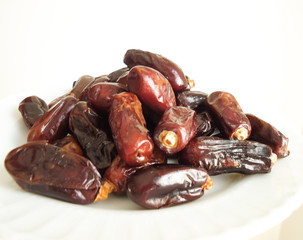dates in the plate, sweet fruits