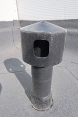 Plastic ventilation chimney on the roof