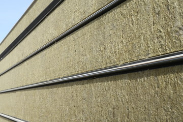 Sandwich panels mounted on the building wall