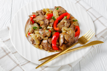 Paleo diet dish chicken liver with onion rings