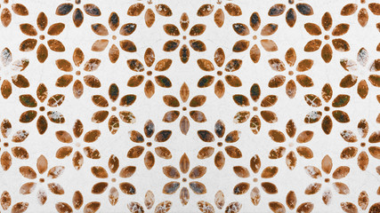 White vintage shabby tiles texture with brown orange flower blossom motif print Background texture