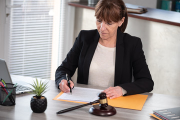 Female lawyer working on document