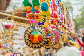 handmade girl ornaments, the art of India from Surajkund handicraft fair
