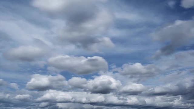 Beautiful blue sky with white clouds in sunny spring day timelapse.