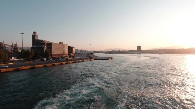 Leaving Port Piraeus in Greece on a Beautiful Sunny Morning. Slow Motion.
