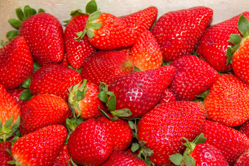The beautiful background of garden strawberries can still have the opportunity to use as a graphic resource. strawberry. Red Strawberry Texture