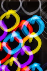 Abstract Neon Lights on Black Background Blurred and Moving 80s Vibe Disco