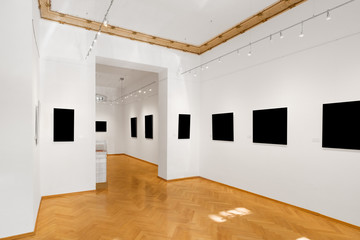empty gallery room or showroom with blank picture frames