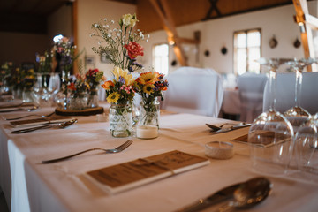 photo of empty wedding hall and empty tables