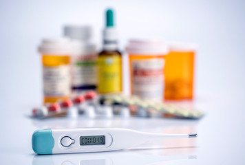 Digital thermometer indicates Covid-19, conceptual image