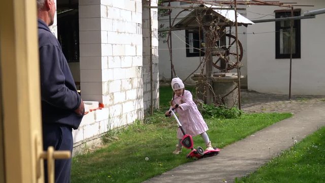 Little girl with grandpa. Grandfather and child.