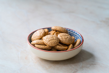 Chewy Soft Italian Amaretti Cookie Biscuits in Ceramic Bowl.