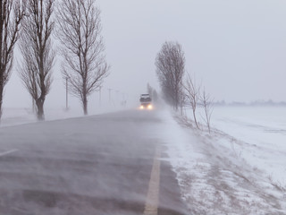 Road under the blizzard, snowstorm