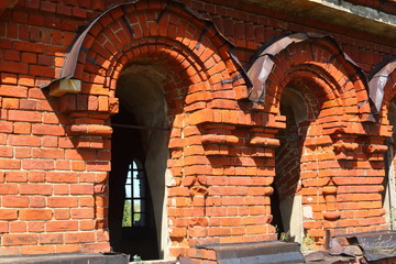abandoned old red brick church