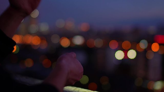 Using a flashlight to send signals in Morse code.