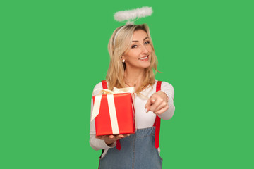 Happy birthday to you! Portrait of beautiful angelic adult woman with halo holding gift box and...