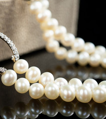 close-up macro photo pearl diamond necklace