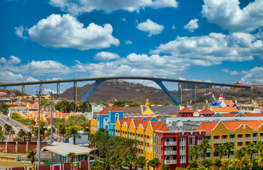 High Bridge Over Resorts in Curacao over colorful resorts - obrazy, fototapety, plakaty