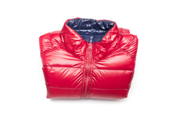 Folded blue and red full zipper windbreaker down jacket, rain proof down jacket. Down jacket sport shiny nylon full zip isolated on white. Folded clothes.