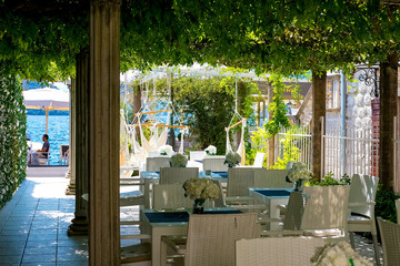 Street cafe by the sea in the old town of Perast, Montenegro.