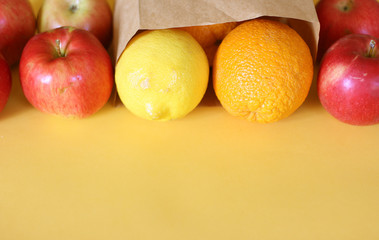 Different health food on yellow background. Flat lay. Grocery shopping and food delivery concept with copyspace