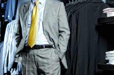 Hand in pocket in a business suit. Close up.