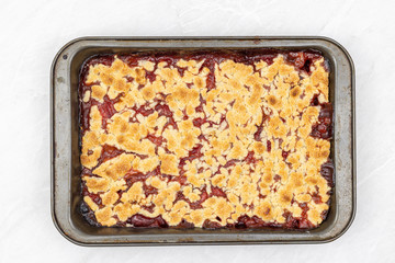 Top view of Strawberry cake baked in the baking tray