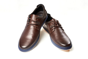 Men fashion brown shoe leather over white background. Pair casual stylish footwear.