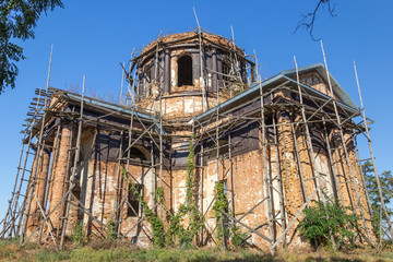 Ancient ruined orthodox temple. The concept of religious architecture, Easter and various religious holidays and denominations in Ukraine. The revival of Orthodoxy.