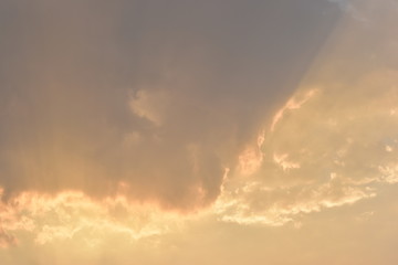 golden light rays of sunset sky background