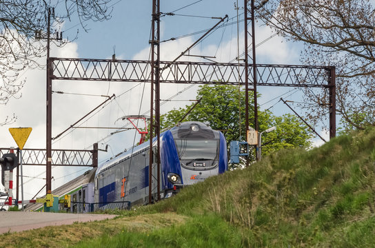 KARLINO, WEST POEMARANIAN / POLAND - 2020: The express train travels railway route