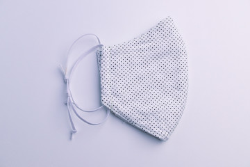 design of white face mask handmade sewing from fashion fabric cotton cloth
