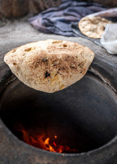 Preparation of organic tandoor bread and layered bread, one of the local flavors of Antioch