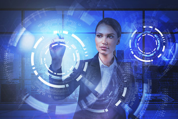 Woman using HUD interface in office
