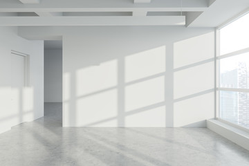 Blank wall in empty white industrial style office
