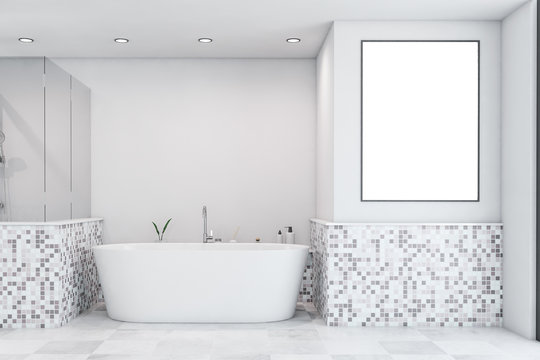 White mosaic bathroom with tub and poster