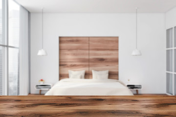 Fototapeta na wymiar Table in white and wood panoramic bedroom