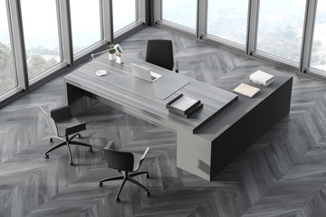 Fototapeta na wymiar Gray wood table in panoramic CEO office, top view