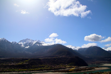 Nanjiabawa, one of the ten most beautiful mountains in China, is hidden between the blue sky and white clouds. No one has reached the summit so far!