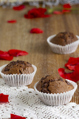 Three muffins with poppy petals