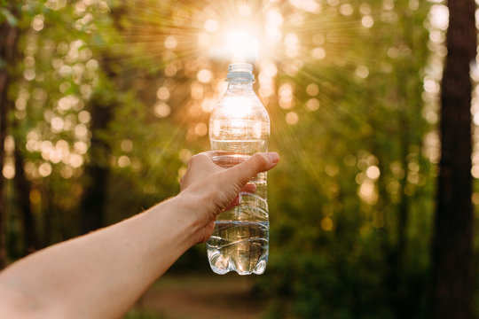 splash water bottle plastic light shine sun