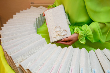 Woman holds handmade tissue cards in her hands