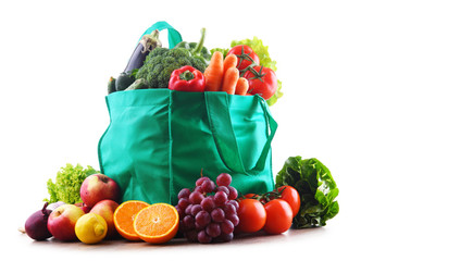 Shopping bag with vegetables and fruits isolated on white