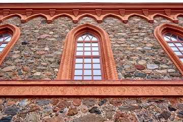 Tall window of the stone church