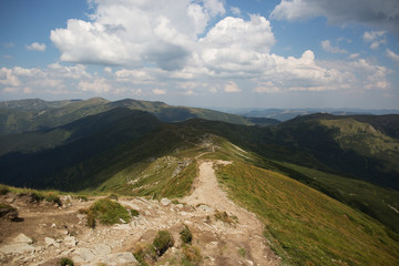 Hiking in the mountains. Hiking trail for tourists