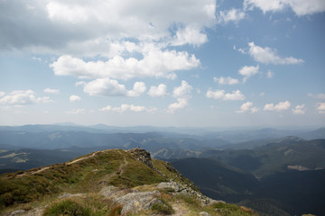 Fototapeta premium Holidays for the weekend. Traveling through beautiful green mountains