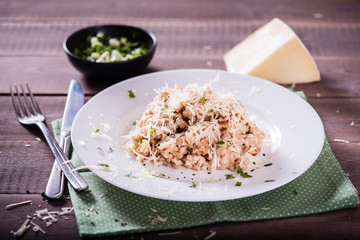 risotto with mushrooms, fresh herbs and parmesan cheese. Tasty and healthy vegetarian lunch