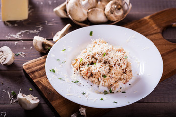 risotto with mushrooms, fresh herbs and parmesan cheese. Tasty and healthy vegetarian lunch